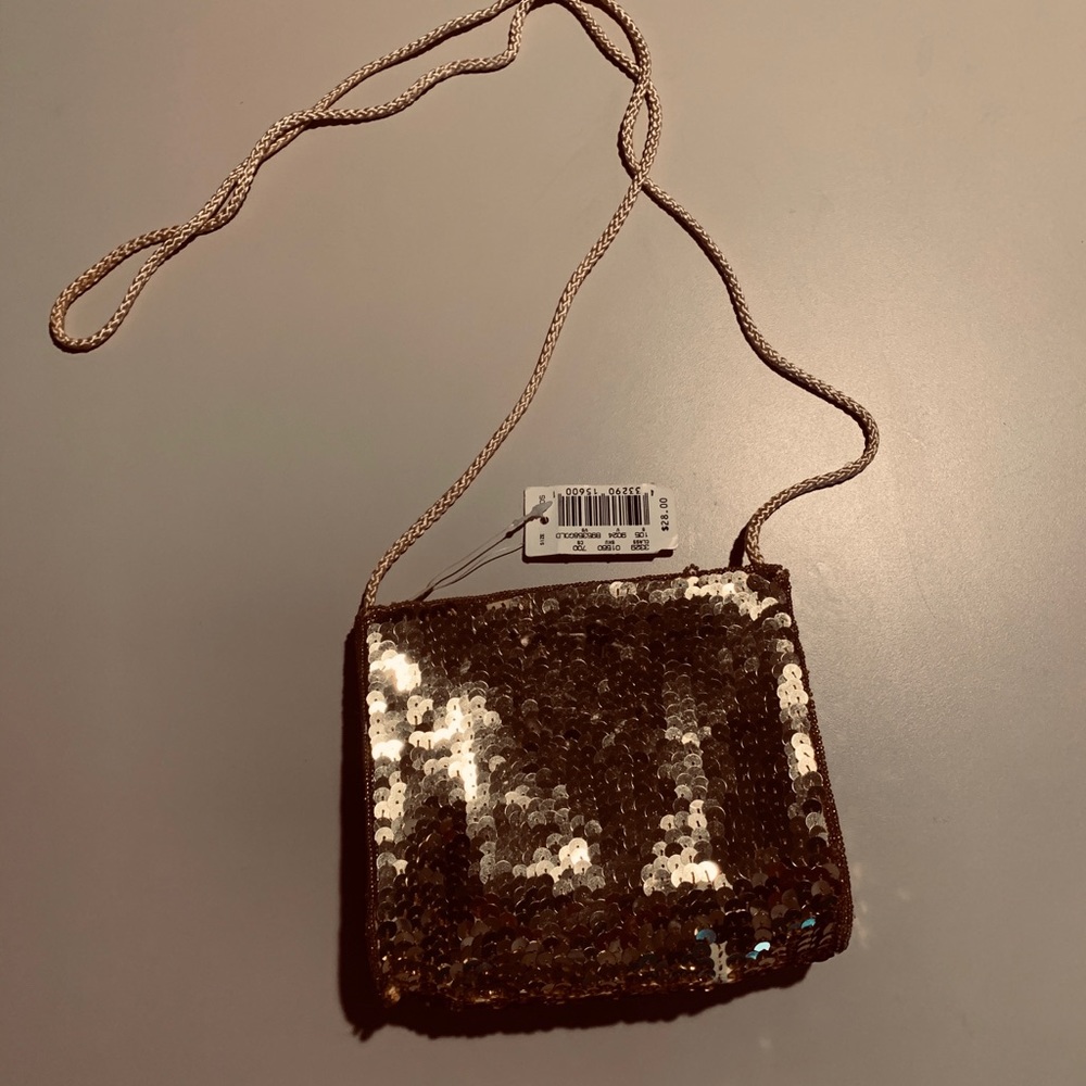 Accessory Lady golden purse with tags